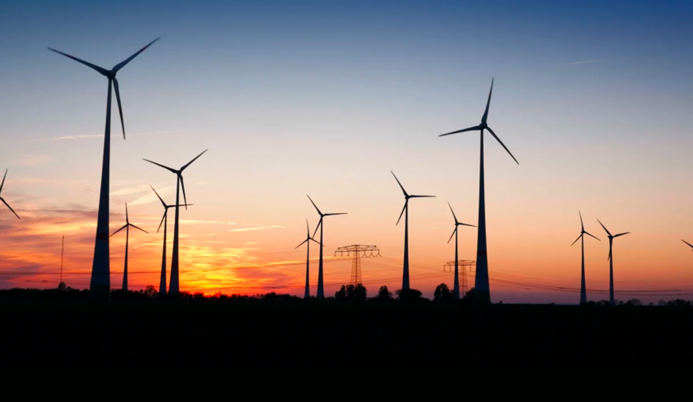 Windmills at sunset (image)