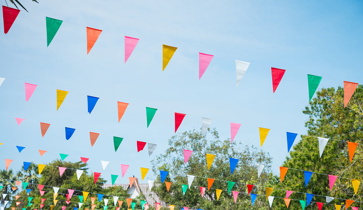 colorful flags hanging in an event 