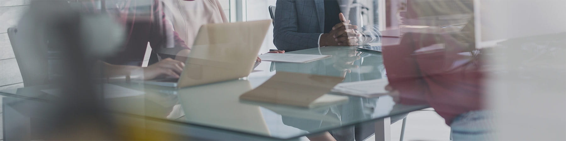 glass conference table during meeting