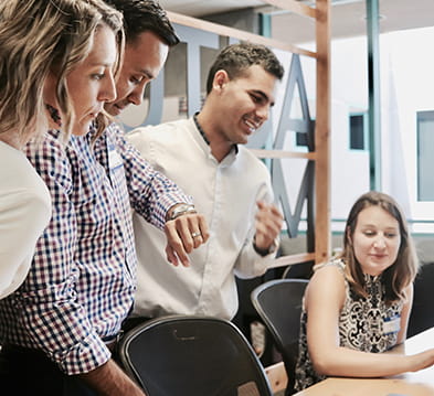 People happy and smiling at work